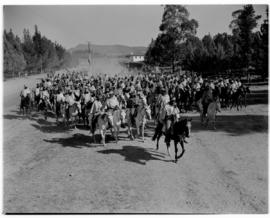 Basutoland, 12 March 1947. Large number of mounted Basutos riding to the Pitso tribal meeting.Tra...