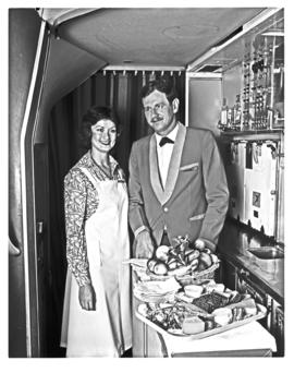 
SAA Boeing 747 interior. Cabin service. Steward and hostess. Galley.
