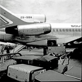 Durban, 1970. Louis Botha airport. SAA Boeing 727 ZS-SBA 'Tugela' unloading cargo.