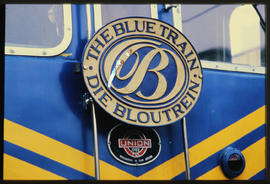 
Close-up of SAR Class 6E1 of the Blue Train showing 1988 logo.
