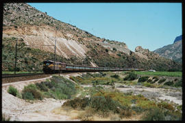 De Doorns district. SAR Class 5E with Trans-Karoo passenger train in the Hex River Valley.