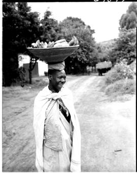 Tzaneen district, 1951. Woman in village.