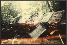 Derailed and overturned steam locomotive.
