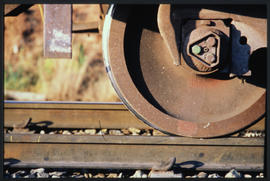 August 1989. Detail of train wheel on rail. [Sonja Grunbauer]