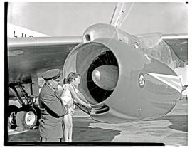 Johannesburg, 1960. Jan Smuts airport. SAA Boeing 707 ZS-CKC 'Kaapstad'. Pilot holding little gir...