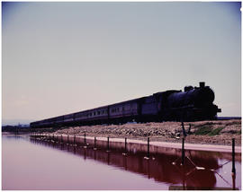 Port Elizabeth district, January 1972. Passenger train hauled by SAR Class ? [S Mathyssen]
