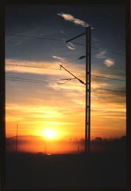 De Aar, March 1986. 25kV AC electrification, Beaufort West - De Aar line, cantilever mast, SA Tra...