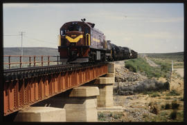 
SAR Class 34-000 No 34-532 with goods train on steel bridge.
