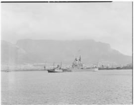 Cape Town, 24 April 1947. SAR tugs assisting 'HMS Vanguard' sailing away at conclusion of tour.