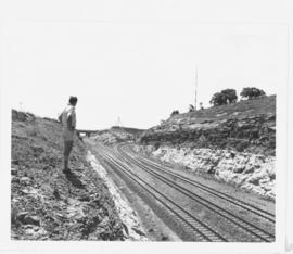 Richards Bay, November 1975. Railway line turnout under construction in long cutting.
