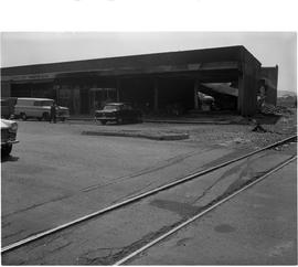 Johannesburg, September 1964. Damage done to building at Natalspruit after derailment of petrol t...