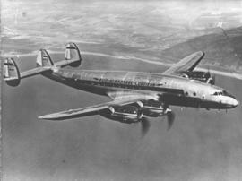 SAA Lockheed Constellation ZS-DBR 'Cape Town' in flight along California coast. See P3511_13 and ...
