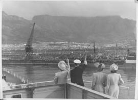 Cape Town, 24 Aprl 1947. Royal family wave goodbye as 'HMS Vanguard' steams out of Table Bay harb...
