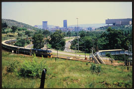 Pretoria, 1991. Blue Train passing Unisa campus.