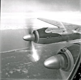 
SAA Vickers Viscount in flight, showing two Rolls-Royce Dart engines through window.
