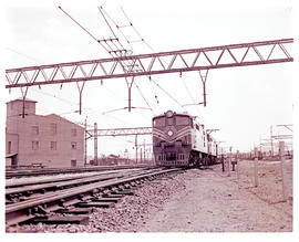 Johannesburg, 1966. SAR Class 5E1 Srs 2 leading with SAR Class 5E Srs 2 with 2up Blue Train betwe...