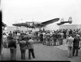 Johannesburg, 26 August 1950. Palmietfontein Airport. Crowd at SAA Lockheed Constellation ZS-DBR ...