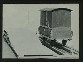 Meccano model of covered 4 wheel wagon.