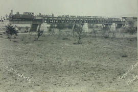 Pretoria. NZASM '46 Tonner' locomotive and train on bridge over he Apies River.