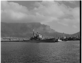 Cape Town, 24 April 1947. SAR tug 'John X Merriman' assisting 'HMS Vanguard' sailing away at conc...