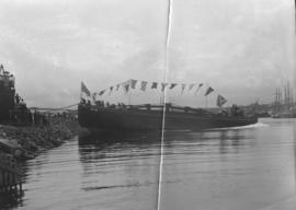 East London. Large boat decorated with flags launched at Buffalo Harbour. Boat building yard.