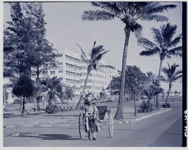 Durban, 1950. Rickshaw in city street.