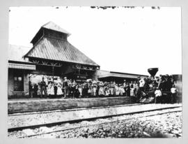 Port Alfred. Group of children from St Paul's Sunday School on platform with decorated locomotive.