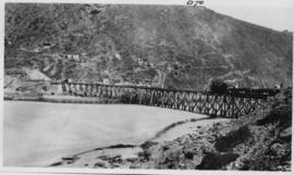 Wilderness, circa 1926. Kaaimans River bridge construction: First test train with test load of 20...