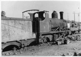 Okiep - Port Nolloth narrow gauge railway. Steam locomotive amidst concrete debris.