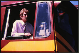 
Driver in locomotive cab.
