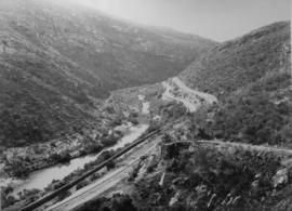 Tulbagh, 1895. Railway line and road running parallel to river in Tulbaghkloof with water tank fe...