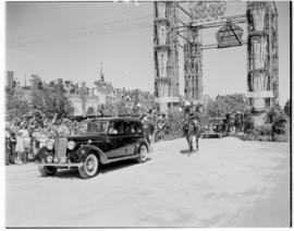 Salisbury, Southern Rhodesia, 7 April 1947. Daimler driving through welcoming arch.