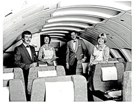 
SAA Boeing 747SP interior. Cabin service. Steward and hostess. Upper deck. Possibly part of the ...