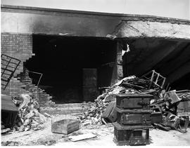 Johannesburg, September 1964. Damage done to building at Natalspruit after derailment of petrol t...