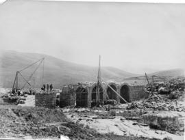 Circa 1893. Five-arch stone bridge under construction at Pompoen culvert, km 215. (NZASM album of...