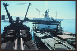 Saldanha, August 1977. Ore carrier docked alongside iron ore loading facility at Saldanha Bay Har...