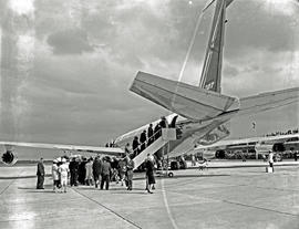 Cape Town, 1960. DF Malan airport. SAA Boeing 707 ZS-CKD 'Cape Town' passengers embarking.