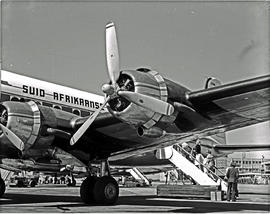 
Douglas DC-4 ZS-BMH. Passengers boarding aircraft.
