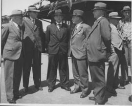 Durban, 1 December 1936. Arrival of first electric locomotive at Durban Platform 6. Group of men,...