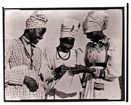 Windhoek district, Namibia, 1937. Three Damara women.