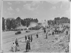 Maseru, Basutoland, 12 March 1947. Royal procession greeted by crowd in open country.