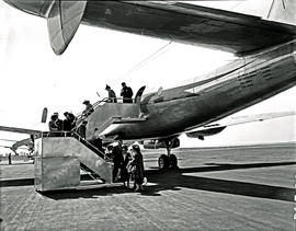 Johannesburg, 1950. Palmietfontein airport. SAA Lockheed Constellation ZS-DBR, disembarking. Note...