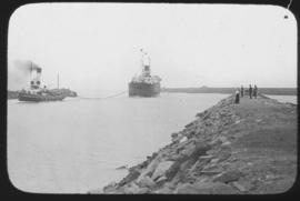 East London. Tug bringing ship into Buffalo harbour.