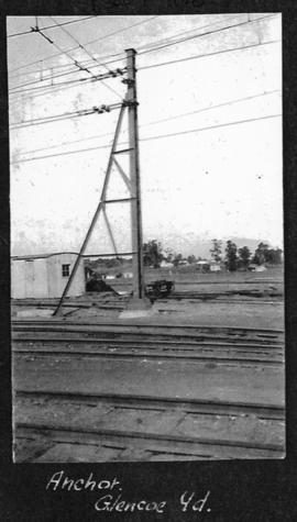 Glencoe, circa 1925. Anchor support for overhead cabling in railway yard. (Album on Natal electri...