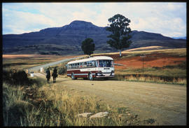 SAR Leyland Olympic tour bus No MT16937 on gravel road.