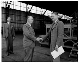 Johannesburg, June 1950. Palmietfontein Airport. Presenting certificate of commendation to Eric v...