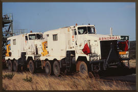 Two SAR trucks led by MT80704 with heavy load.