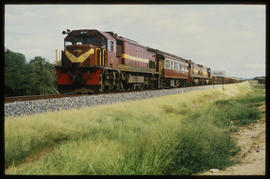 Komatipoort, 1986. SAR Class 37-000 No 37-001 at Mhluwe with test train.