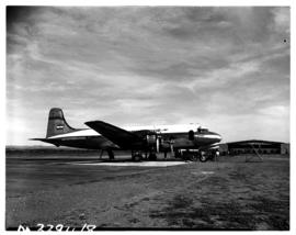 Johannesburg, circa 1953. Palmietfontein Airport. SAA Douglas DC-4, ZS-AUB 'Outeniqua'.