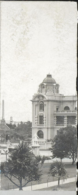 Partial view of large building, probably a city hall.